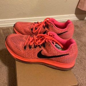 Nike running shoes bright pink and black